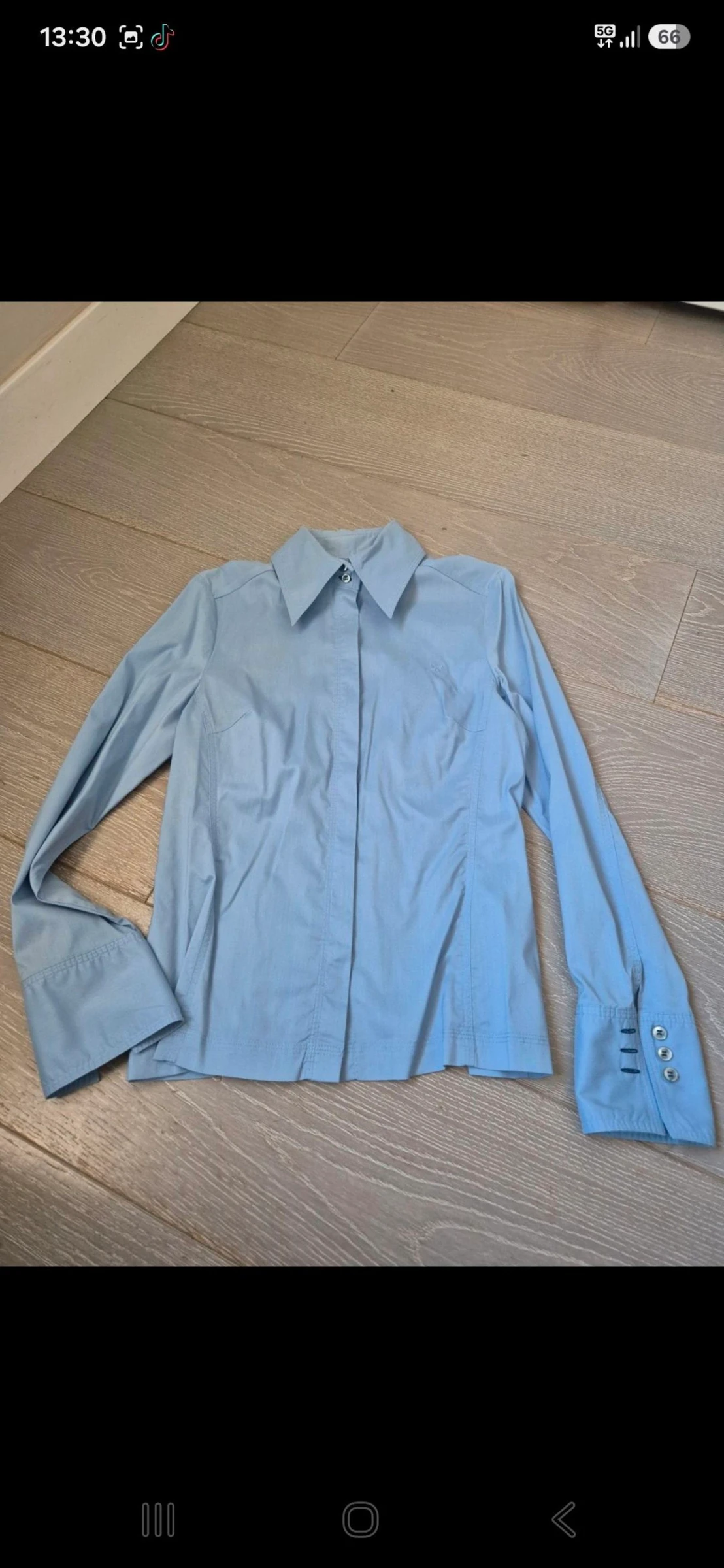 Blusa azul manga larga. Caramelo. Talla 42